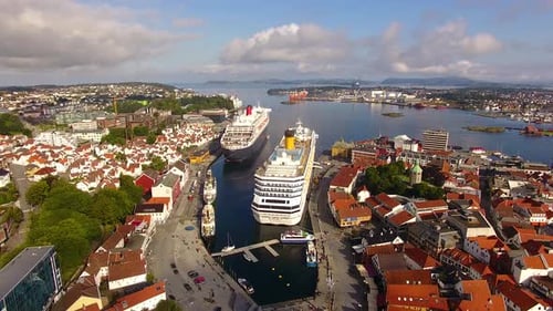 Cruise ships are moored in a harbor of Stavanger in summer, aerial view