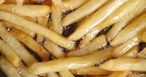 Delicious French Fries Fried in Boiling Oil.