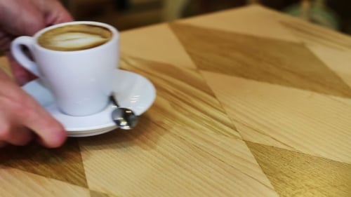 Coffee Cup On Wooden Table.