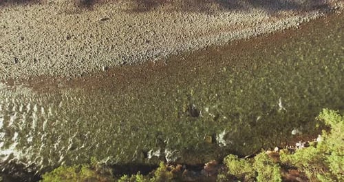 Mid Air Flight Over Fresh and Clean Mountain River at Sunny Summer Morning