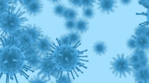 Covid-19 cells floating on blue background.
