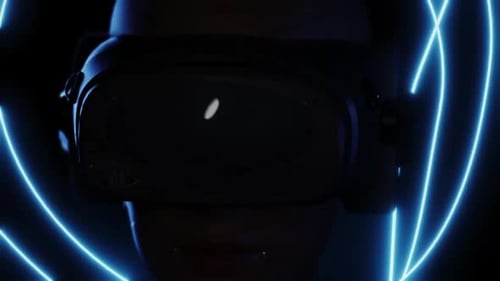Futuristic VR Headset and Cybernetic Head with Neon Light Animation