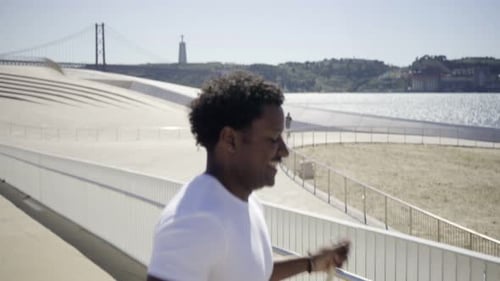 Smiling African American Man During Jumping Rope Workout Outdoor