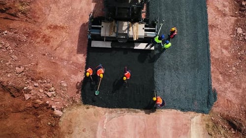 Road Paving Machine Lays New Asphalt Aerial View