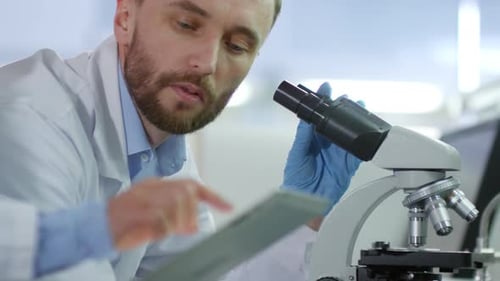 Group of Two Chemists Working Together