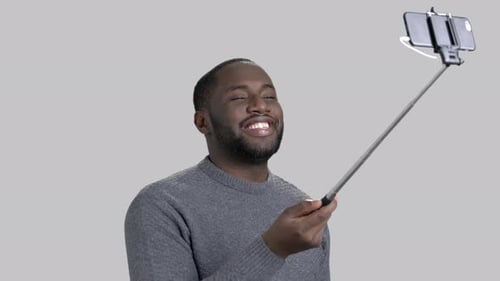 Handsome Guy Using Selfie Stick