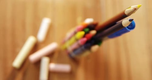 Close-up of colorful crayons and colored pencil