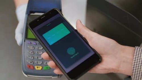Contactless Payment With Smartphone In Supermarket