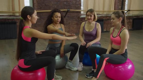 Group of Women Friends Sitting on Exercise Balls
