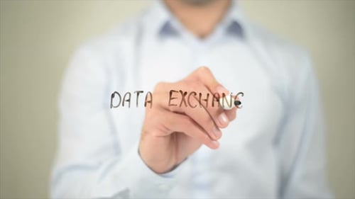 Hand Writes the Word Data Exchange