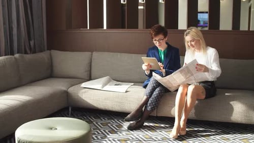 Two Cute Girls Preparing for Exams Indoors