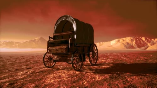 Vagón retro cubierto de lona en el desierto al atardecer