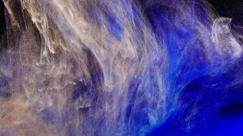 Blue and Gold Dust Cloud Swirls in Space