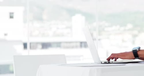 Man using laptop with coffee