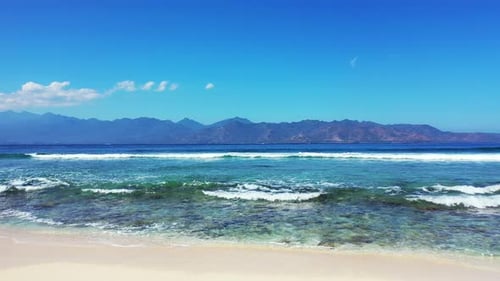 Daytime drone clean view of a sandy white paradise beach and blue water background in best quality 4