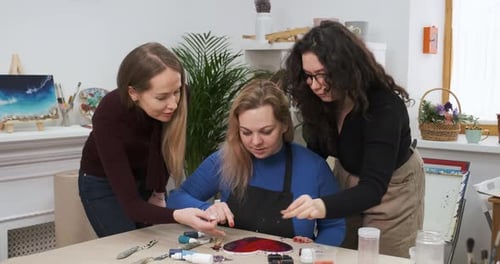 Women Creating Art Together in Studio