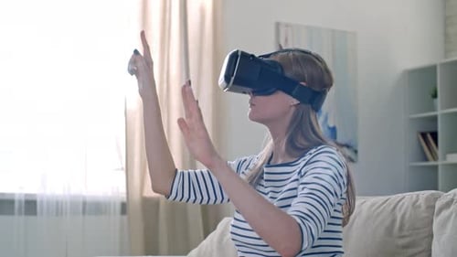 Woman Using Virtual Reality Headset in Bright Room