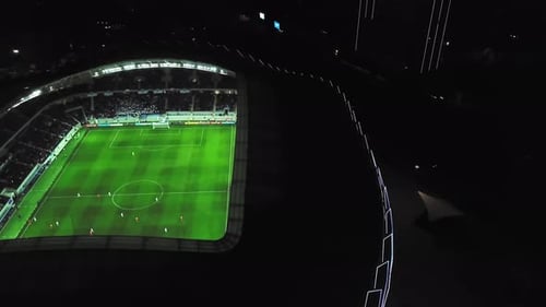 View of stadium with football field in middle of city of Batumi in Georgia