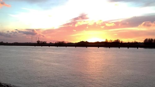 Golden Sunset Reflecting on Calm Water