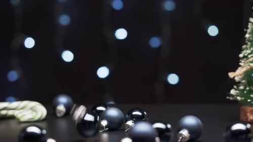 Falling Christmas Balls on Black Background
