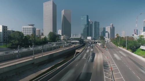 Urban Highway with Traffic and Train in City