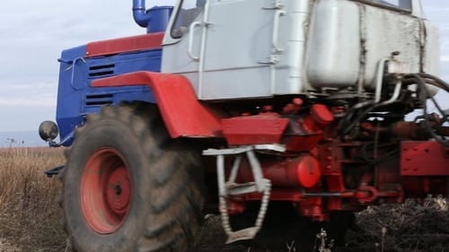 Tractor Plowing Land