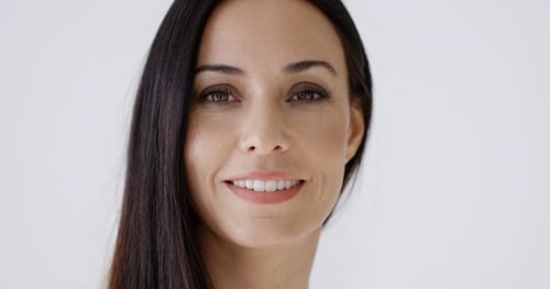 Elegant Woman Smiling Gently, Close Up Portrait