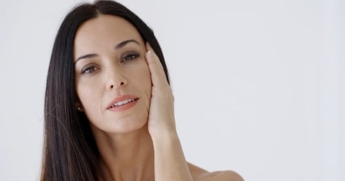 Elegant Woman Posing With a Radiant Smile