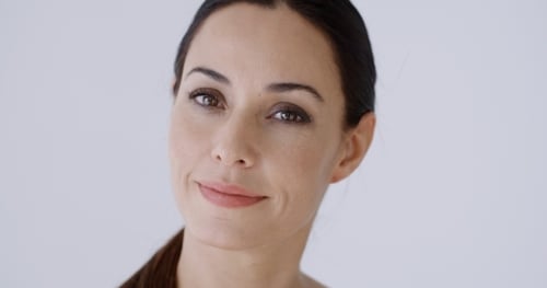 Beautiful Woman Smiling in a Close Up Portrait