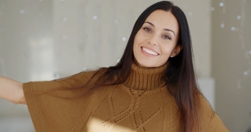 Happy Vivacious Young Woman Indoors At Home