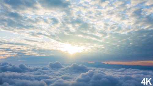 Breathtaking Sunrise Over Clouds Aerial View