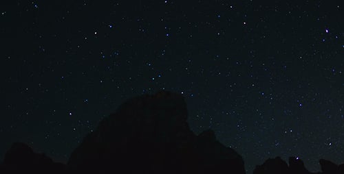 Mountain Silhouette with Twinkling Starry Night Sky