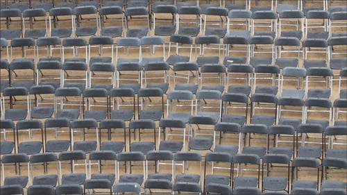 Rows of Empty Folding Chairs from Above
