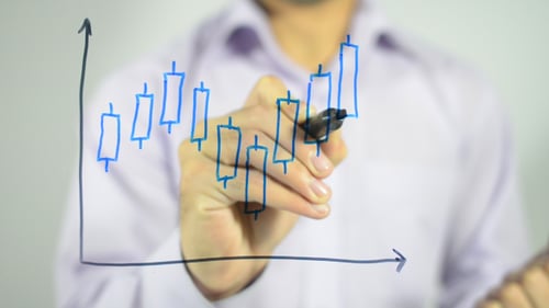 Business Graph Drawn on Glass Surface