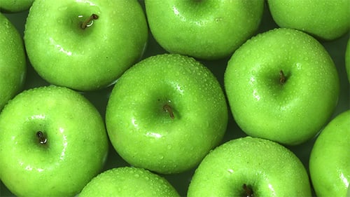 Fresh Green Apples with Water Droplets Close Up