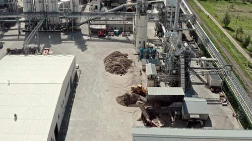 Aerial Drone View. Factory Industrial Zone, Wood Processing Factory Warehouses, Workers Inside the