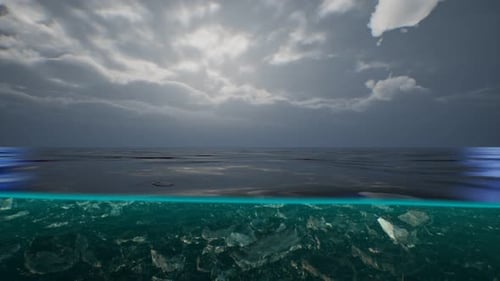 Split View Over and Under Water in the Caribbean Sea with Clouds