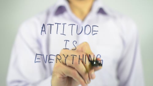 Hand Writing Message: Attitude Is Everything