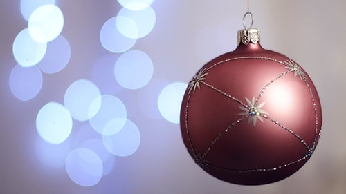 Festive Christmas Ornament Hanging with Bokeh Lights