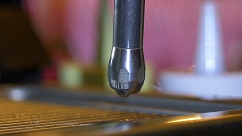 Espresso Machine Dispensing Steam in Close Up Shot