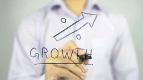 Arrow and Growth Drawn on Clear Surface