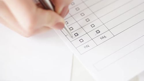 Completing Form with Yes Checkbox Close Up