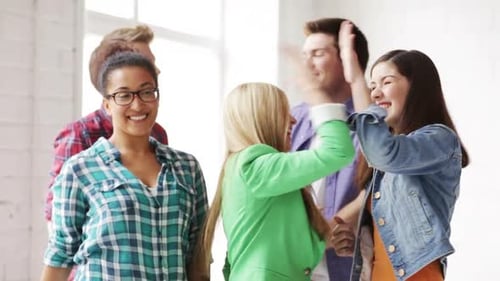 Students In School With Expression Of Triumph