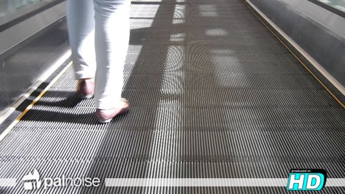 Moving Walkway With One Person Walking Across