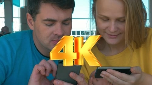 Couple Shares Content on Mobile Phones