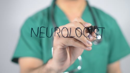 Medical Worker Writes Neurologist on Clear Surface