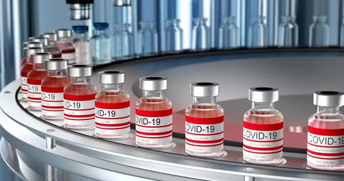 SARSCOV2 COVID19 Mass Production of Coronavirus Vaccine a Machine Pours the Vaccine Seals Bottle