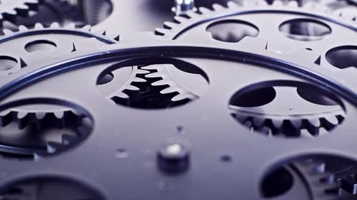 Close Up of Turning Metallic Gears