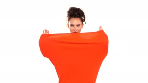 Attractive Woman Modeling with Orange Cloth