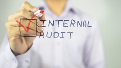 Internal Audit Approval Marked with Red Pen